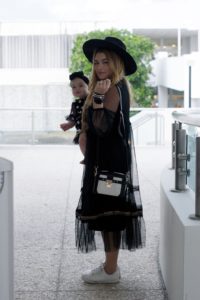 miami-fashion-blogger-kimberly-pfaehler-oh-lola-blog-midi-dress-ethnic-boho-chic-black-dress-tennis-shoes-black-hat-mommy-and-me-fashion-baby-girl-fashion-polka-dots