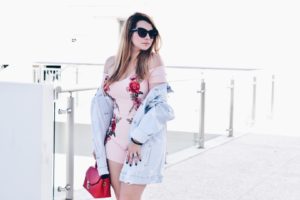 Oh Lola Blog. Agaci blush romper with red embroidered flowers and oversized denim jacket. Miami fashion blogger.