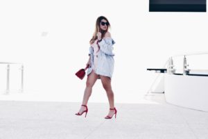 Oh Lola Blog. Agaci blush romper with red embroidered flowers and oversized denim jacket. Miami fashion blogger. 